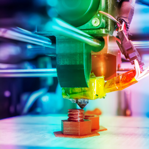 Rainbow colored 3D printer in the process of creating a bolt. Rainbow colored 3D printer in the process of creating a bolt.