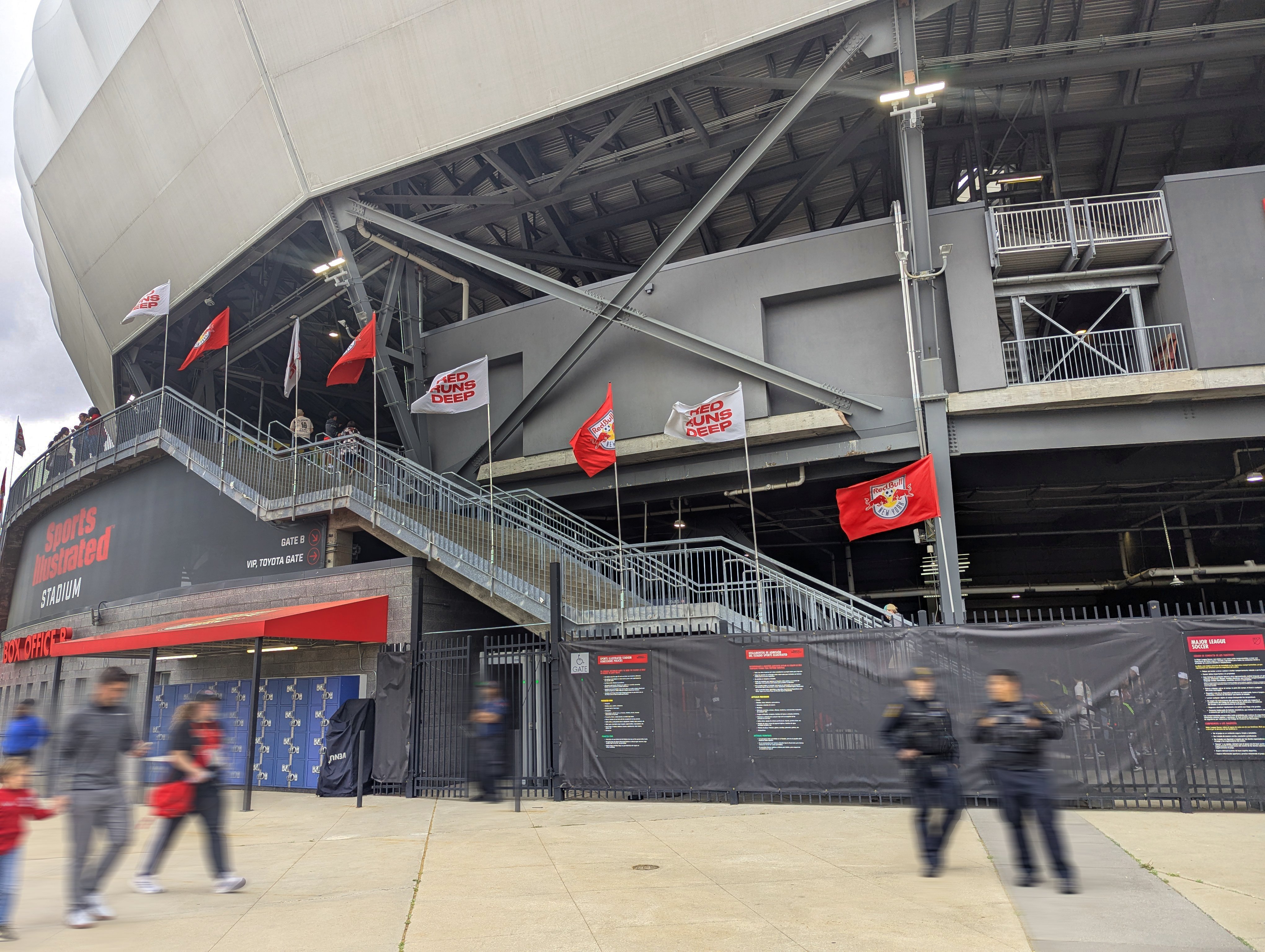 Exterior Flags, Fence Mesh, and Dimensional Lettering at Sports Illustrated Stadium