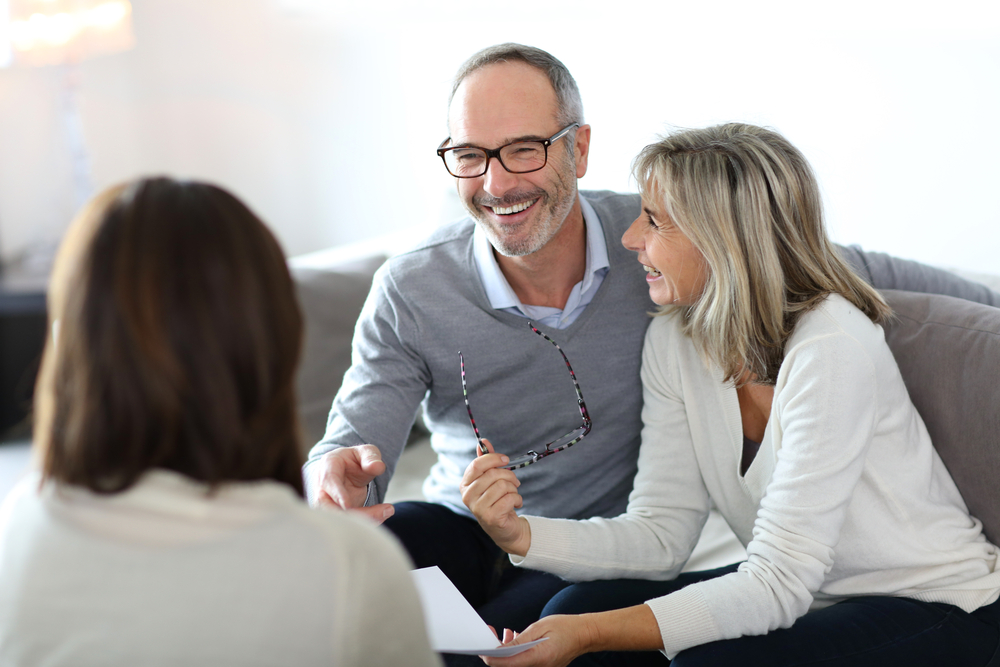 Senior couple meeting financial adviser for investment Senior couple meeting financial adviser for investment